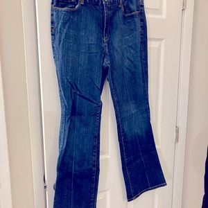 7 Seven boot cut denim jeans.